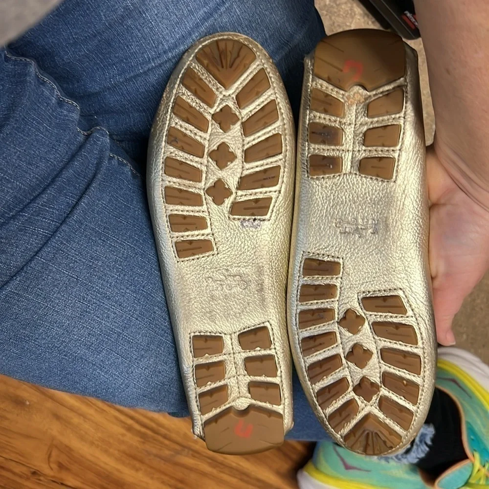 Coach women’s gold loafer Size 7 1/2